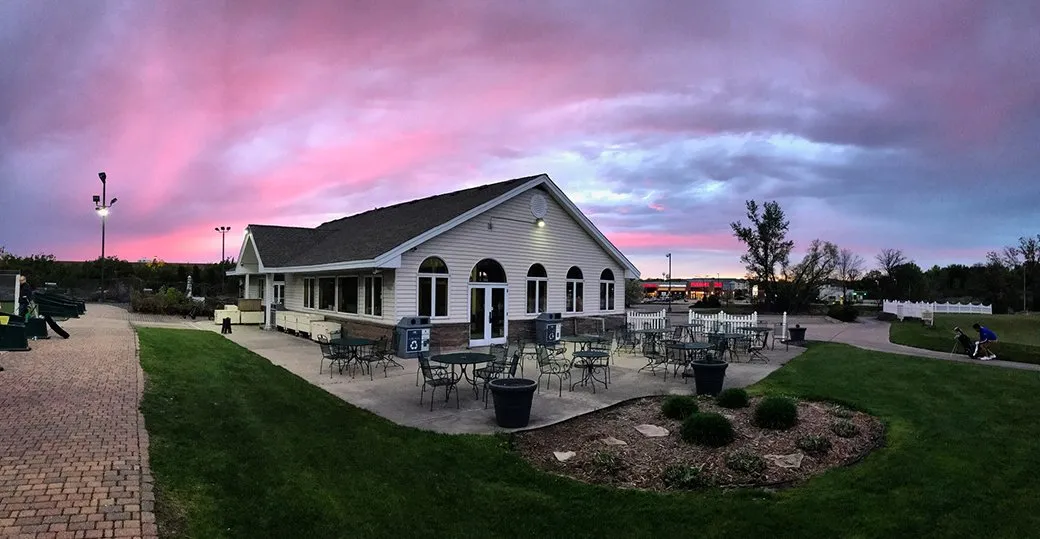 View of clubhouse at sunset